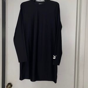 Ladies casual wear dress. The back is fitted around the neck. Never worn.